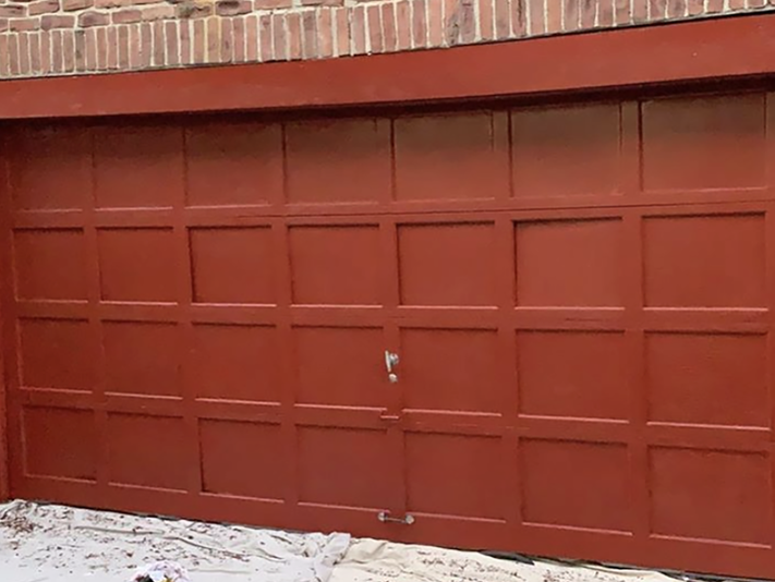 Newly painting garage door in red