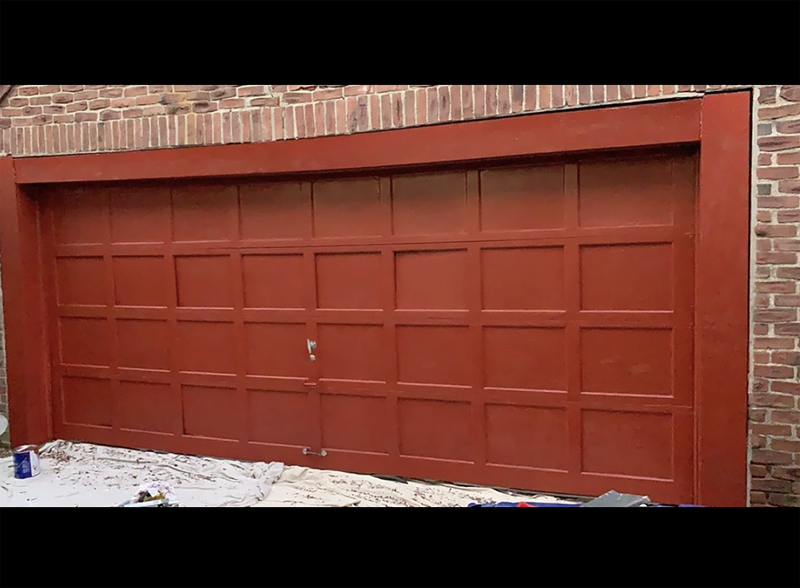 Newly painting red garage door